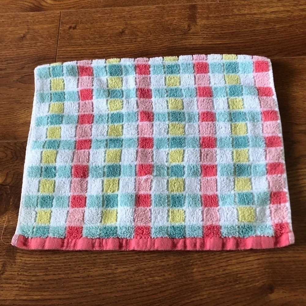 pink and green striped hand towel